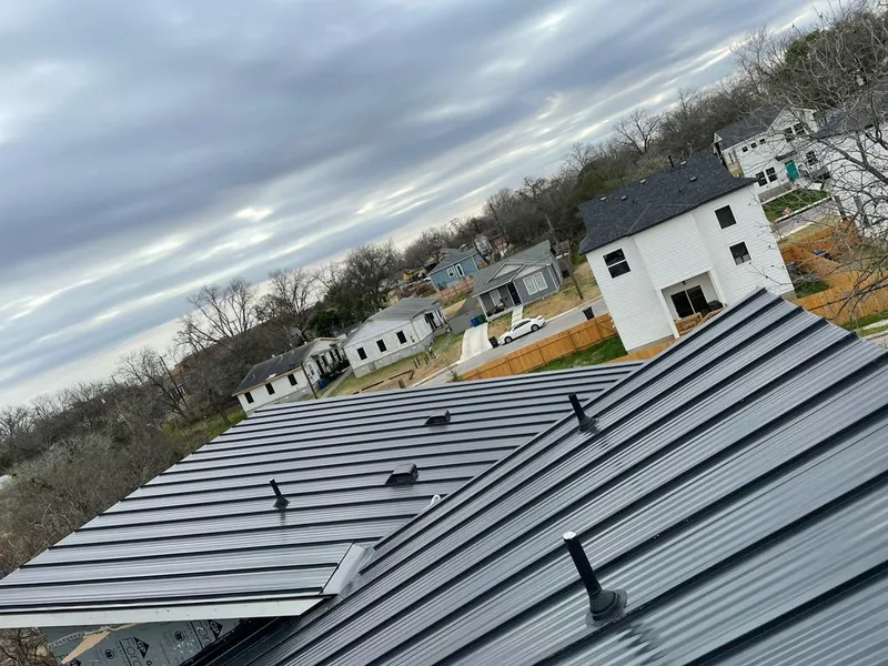 Standing seam metal roof panels with vents for Skylight Repair in Kelso
